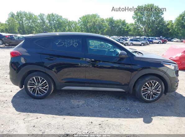 KM8J3CAL9LU135024 2020 HYUNDAI TUCSON Black Vista interior trasera