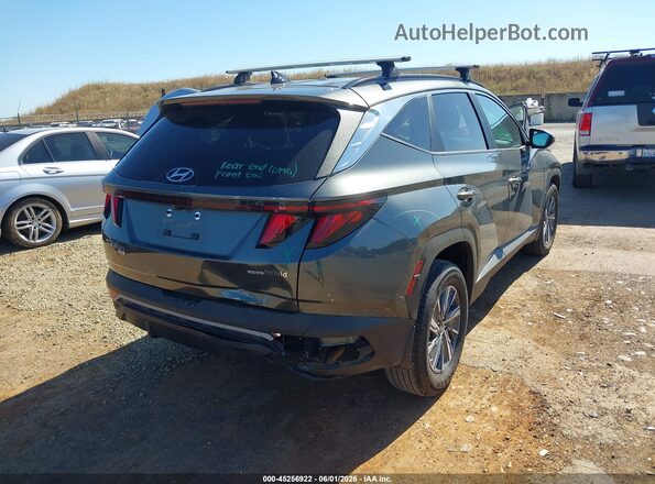 KM8JBCD10RU214541 2024 HYUNDAI TUCSON HYBRID Gray Front view