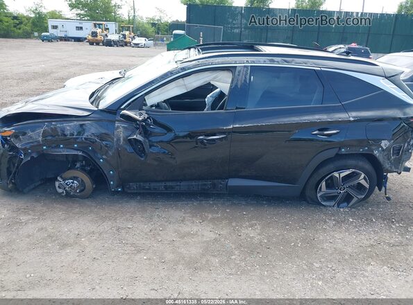KM8JECA18PU094366 2023 HYUNDAI TUCSON HYBRID Black Rear interior view