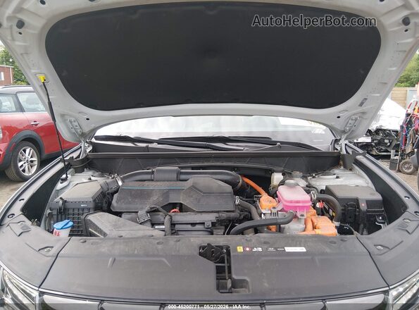 KM8JECD19RU146487 2024 HYUNDAI TUCSON HYBRID Silver Rear view