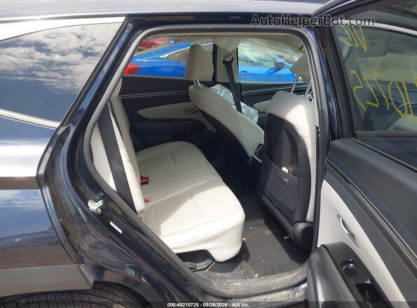 KM8JFCA18PU136385 2023 HYUNDAI TUCSON HYBRID Black VIN sticker view
