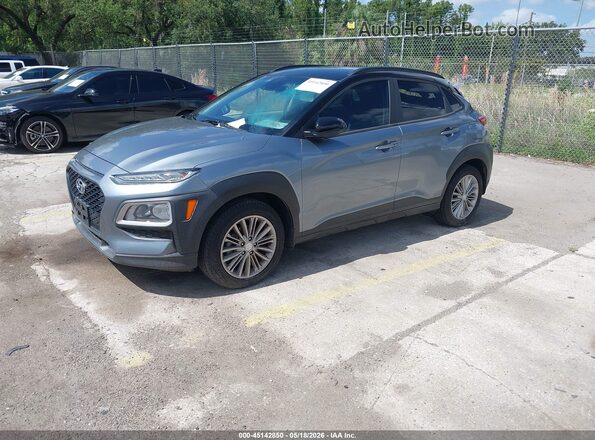 KM8K22AA2KU234718 2019 HYUNDAI KONA Gray Vista tres cuartos delantera izquierda