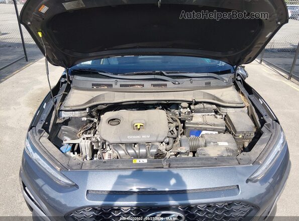 KM8K2CAA0JU154564 2018 HYUNDAI KONA Серый Вид сзади