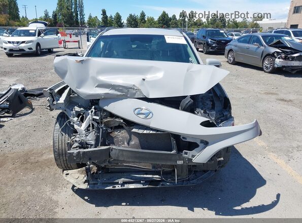 KM8K6CAB7PU054015 2023 HYUNDAI KONA Gray Vista interior trasera