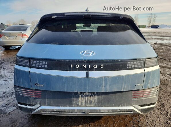 KM8KNDDF5RU323641 2024 HYUNDAI IONIQ Blue Rear view
