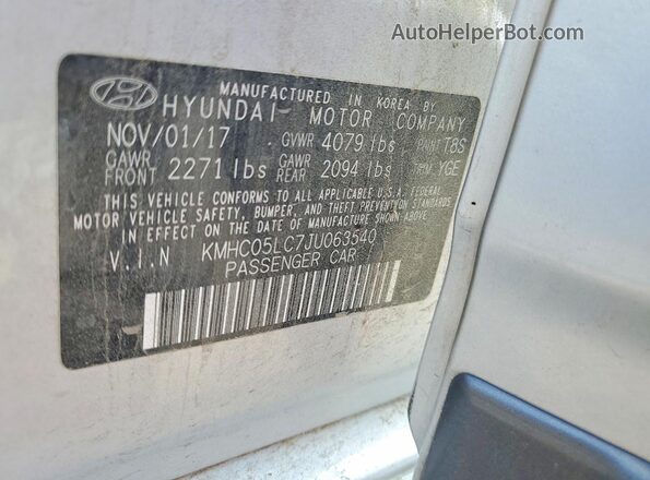 KMHC05LC7JU063540 2018 HYUNDAI IONIQ Silver VIN კოდის სტიკერის ხედი