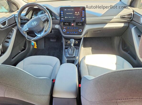 KMHC75LC9MU250987 2021 HYUNDAI IONIQ Бордовый Вид панели приборов