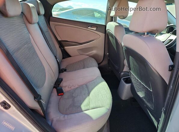 KMHCT4AE3GU161074 2016 HYUNDAI ACCENT Silver Rear seats view