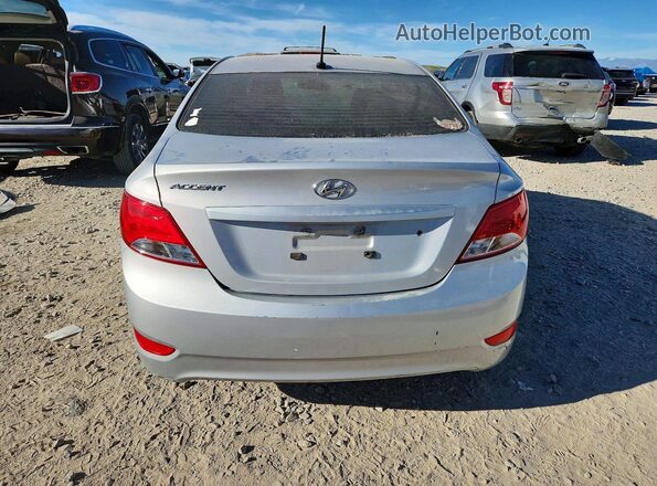 KMHCT4AE3GU161074 2016 HYUNDAI ACCENT Silver Rear view