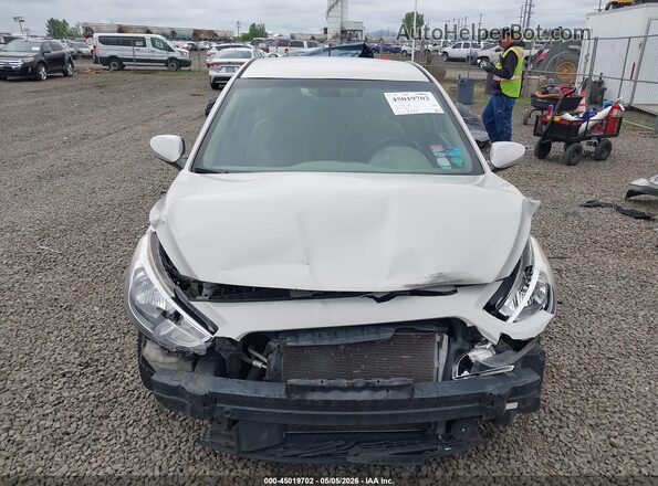 KMHCT4AE4GU033362 2016 HYUNDAI ACCENT Белый Вид задней части салона