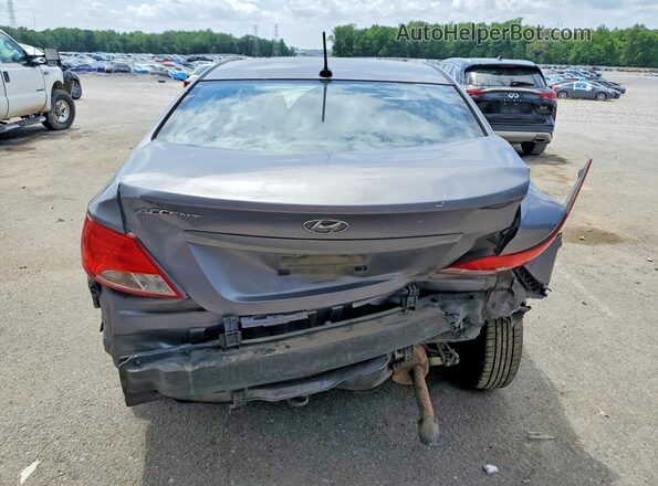 KMHCT4AE7GU990794 2016 HYUNDAI ACCENT Gray Rear view