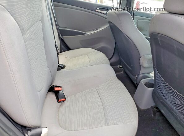 KMHCT4AE7GU990794 2016 HYUNDAI ACCENT Gray Rear seats view