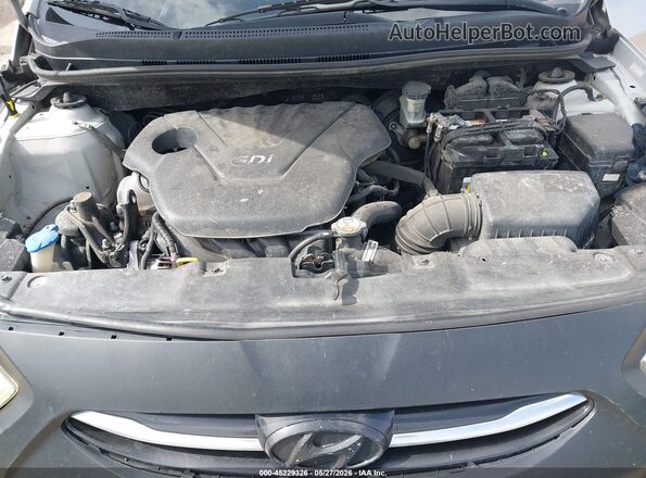 KMHCT4AE8HU193438 2017 HYUNDAI ACCENT Silver უკანა ხედი