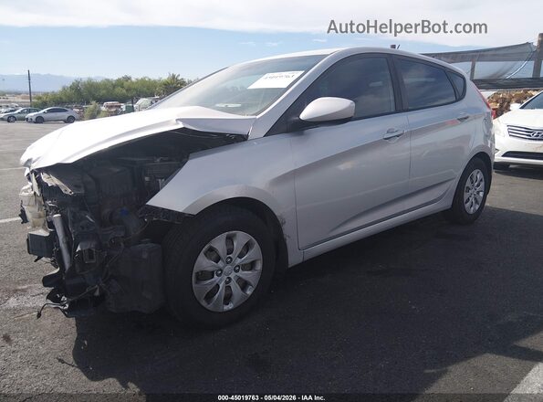 KMHCT5AE2GU291935 2016 HYUNDAI ACCENT Silver Front left