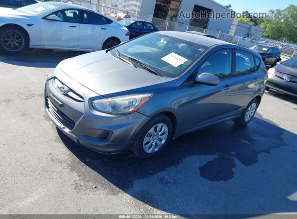 KMHCT5AE3GU257549 2016 HYUNDAI ACCENT Gray Front left