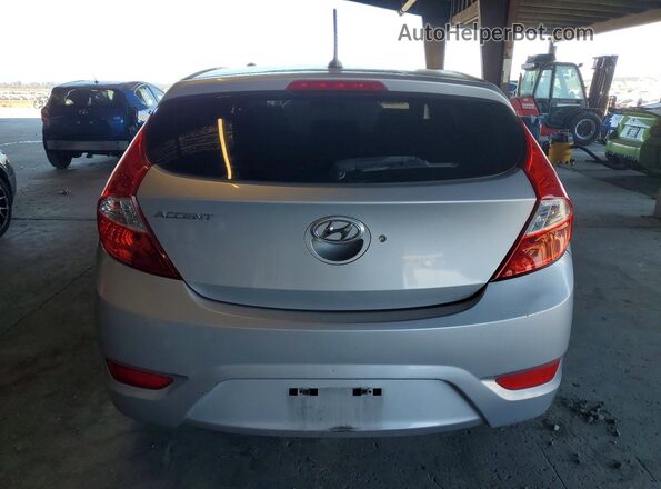 KMHCT5AE7HU325904 2017 HYUNDAI ACCENT Серебряный Вид сзади