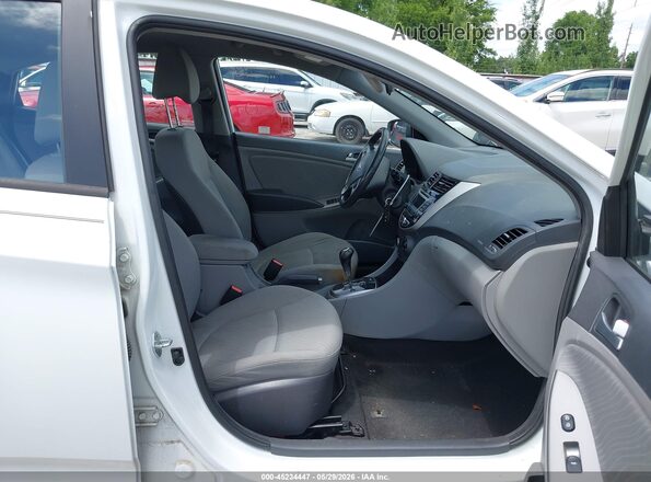 KMHCU4AEXGU046100 2016 HYUNDAI ACCENT White წინა სალონის ხედი