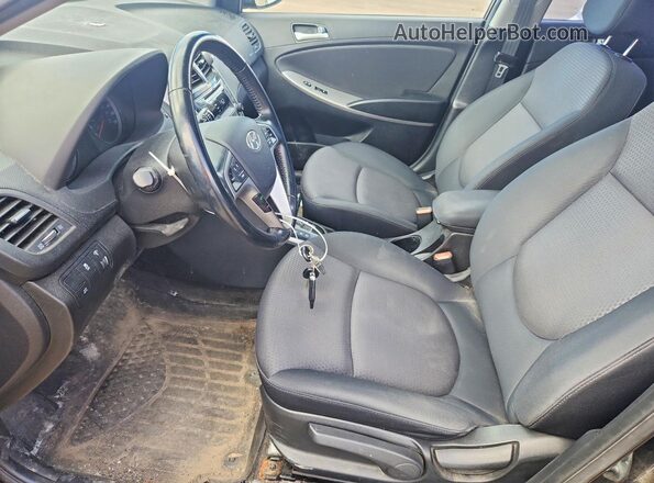 KMHCU5AE2GU249259 2016 HYUNDAI ACCENT Black Widok wnętrza z przodu