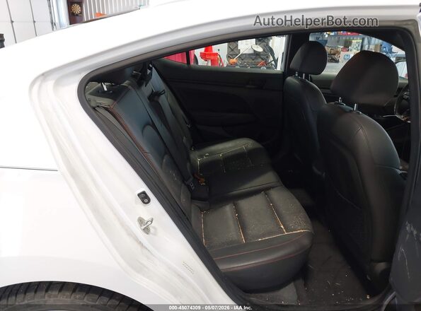 KMHD04LB3JU450706 2018 HYUNDAI ELANTRA White VIN კოდის სტიკერის ხედი