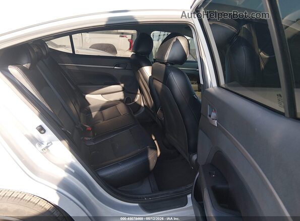 KMHD84LF0JU504328 2018 HYUNDAI ELANTRA Silver VIN კოდის სტიკერის ხედი