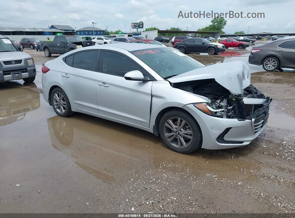 KMHD84LF2JU661147 2018 HYUNDAI ELANTRA Silver Rear interior view
