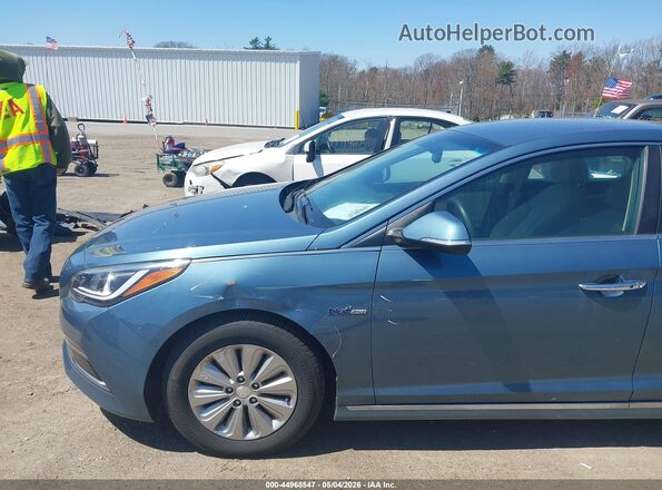 KMHE24L18GA016362 2016 HYUNDAI SONATA HYBRID Blue Vista interior trasera