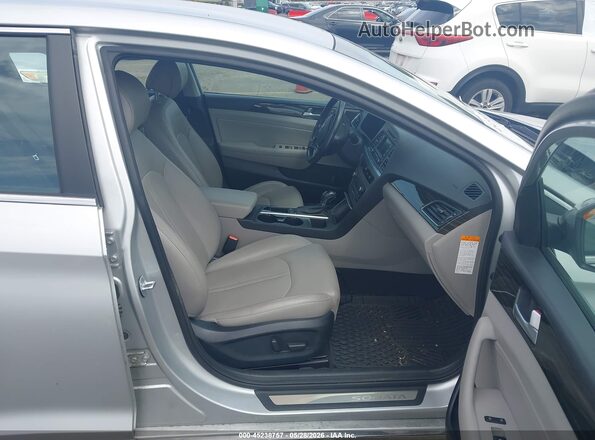 KMHE34L10GA020595 2016 HYUNDAI SONATA HYBRID Silver Widok wnętrza z przodu