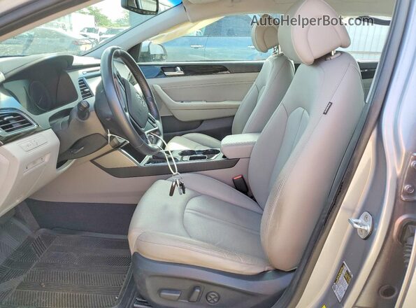 KMHE34L14HA050975 2017 HYUNDAI SONATA Silver Vista interior delantera