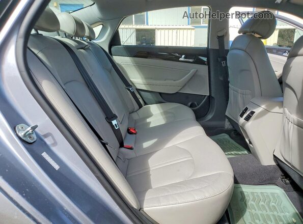 KMHE34L14HA050975 2017 HYUNDAI SONATA Silver Vista de los asientos traseros