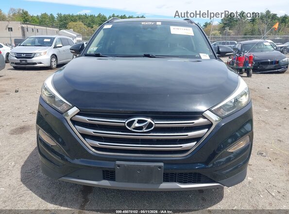 KM8J3CA25GU233237 2016 HYUNDAI TUCSON Black 