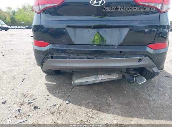 KM8J3CA25GU233237 2016 HYUNDAI TUCSON Black 
