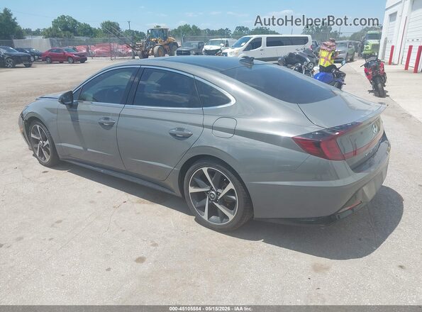 KMHL44J27PA276703 2023 HYUNDAI SONATA Gray Trasero izquierdo