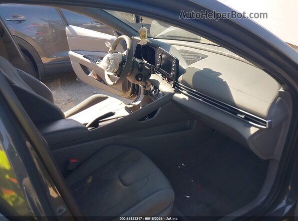 KMHLL4AG5PU574499 2023 HYUNDAI ELANTRA Серый Вид салона спереди