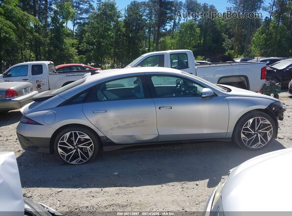KMHM34AA9PA041301 2023 HYUNDAI IONIQ 6 Silver Rear interior view