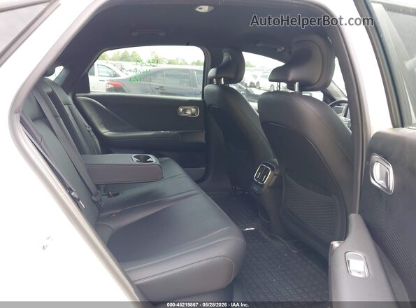KMHM34AC0PA044198 2023 HYUNDAI IONIQ 6 White VIN կոդի պիտակի տեսք