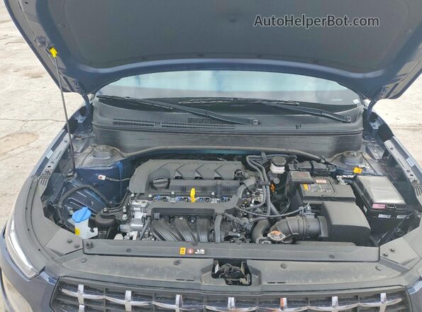 KMHRC8A31TU437665 2026 HYUNDAI VENUE Blue Vista del compartimento del motor
