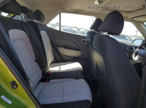 KMHRC8A3XPU217396 2023 HYUNDAI VENUE Green Rear interior view