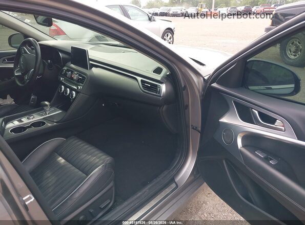 KMTG74LE0MU074415 2021 GENESIS G70 Silver Front interior view