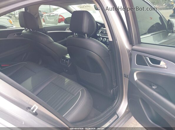 KMTG74LE0MU074415 2021 GENESIS G70 Silver VIN sticker view