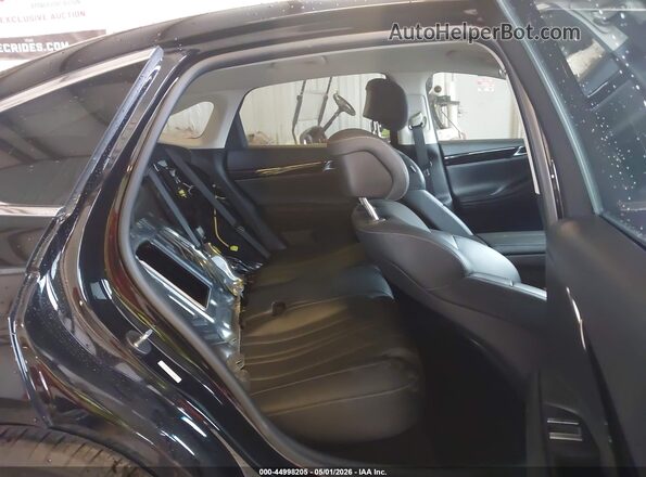 KMTGB4SC0PU196002 2023 GENESIS G80 Black VIN կոդի պիտակի տեսք