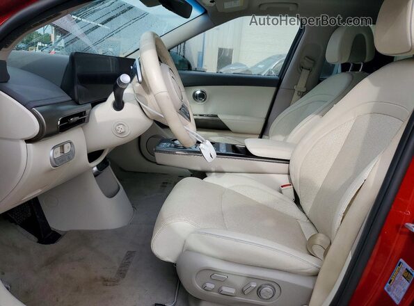 KMUKCDTC2PU017007 2023 GENESIS GV60 Red Widok wnętrza z przodu