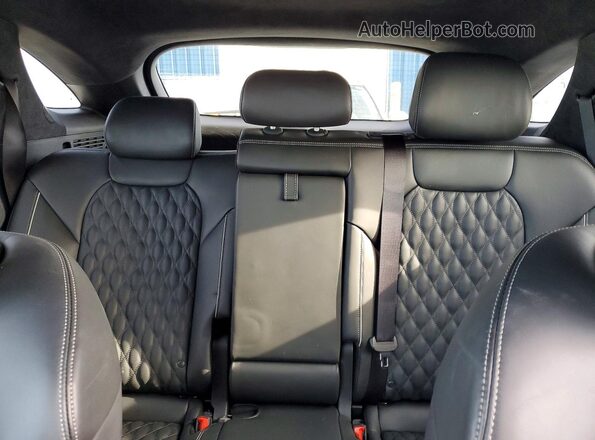 KMUMCDTC3RU150743 2024 GENESIS GV70 Charcoal Vista de los asientos traseros