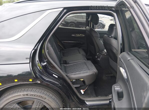 KMUMCDTCXPU096760 2023 GENESIS GV70 Black VIN კოდის სტიკერის ხედი