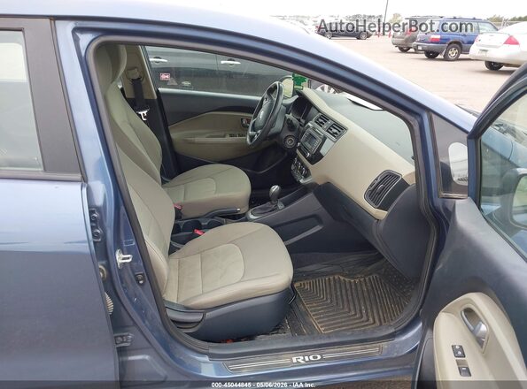 KNADM4A32G6637675 2016 KIA RIO Blue Front interior view