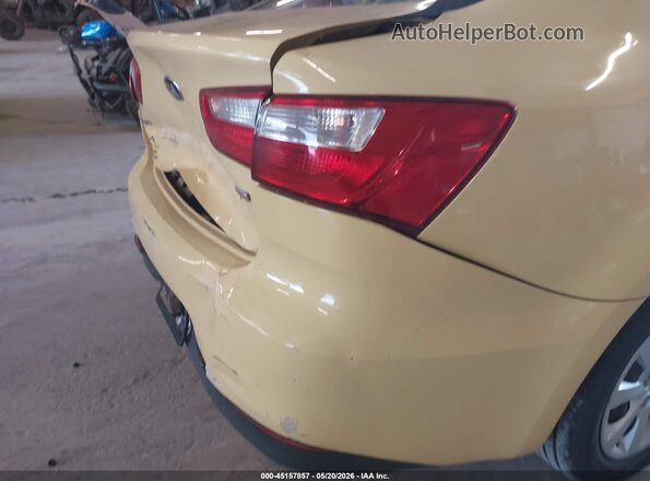 KNADM4A39G6547035 2016 KIA RIO Yellow უკანა სალონის ხედი