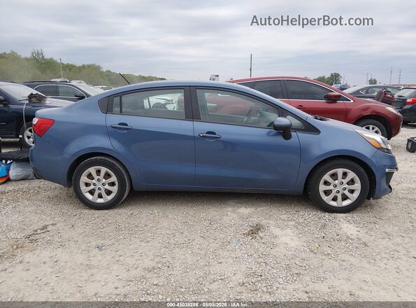 KNADM4A39G6589771 2016 KIA RIO Blue Vista interior trasera