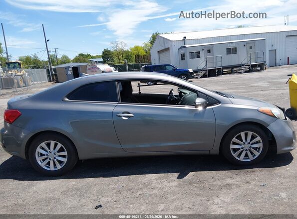 KNAFX6A8XG5634052 2016 KIA FORTE KOUP Gray Vista interior trasera