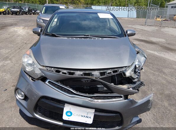 KNAFX6A8XG5634052 2016 KIA FORTE KOUP Gray Vista del cuadro de instrumentos