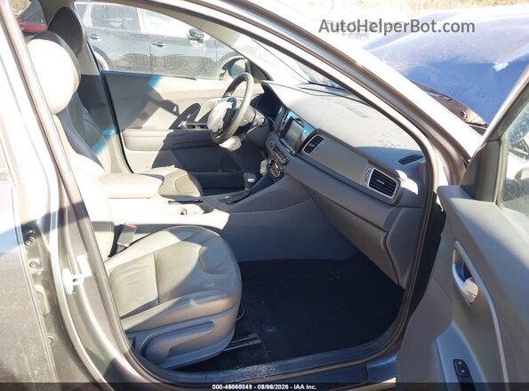 KNDCB3LC5H5049692 2017 KIA NIRO Gray Widok wnętrza z przodu