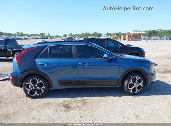 KNDCT3LE3S5249184 2025 KIA NIRO Blue Rear interior view